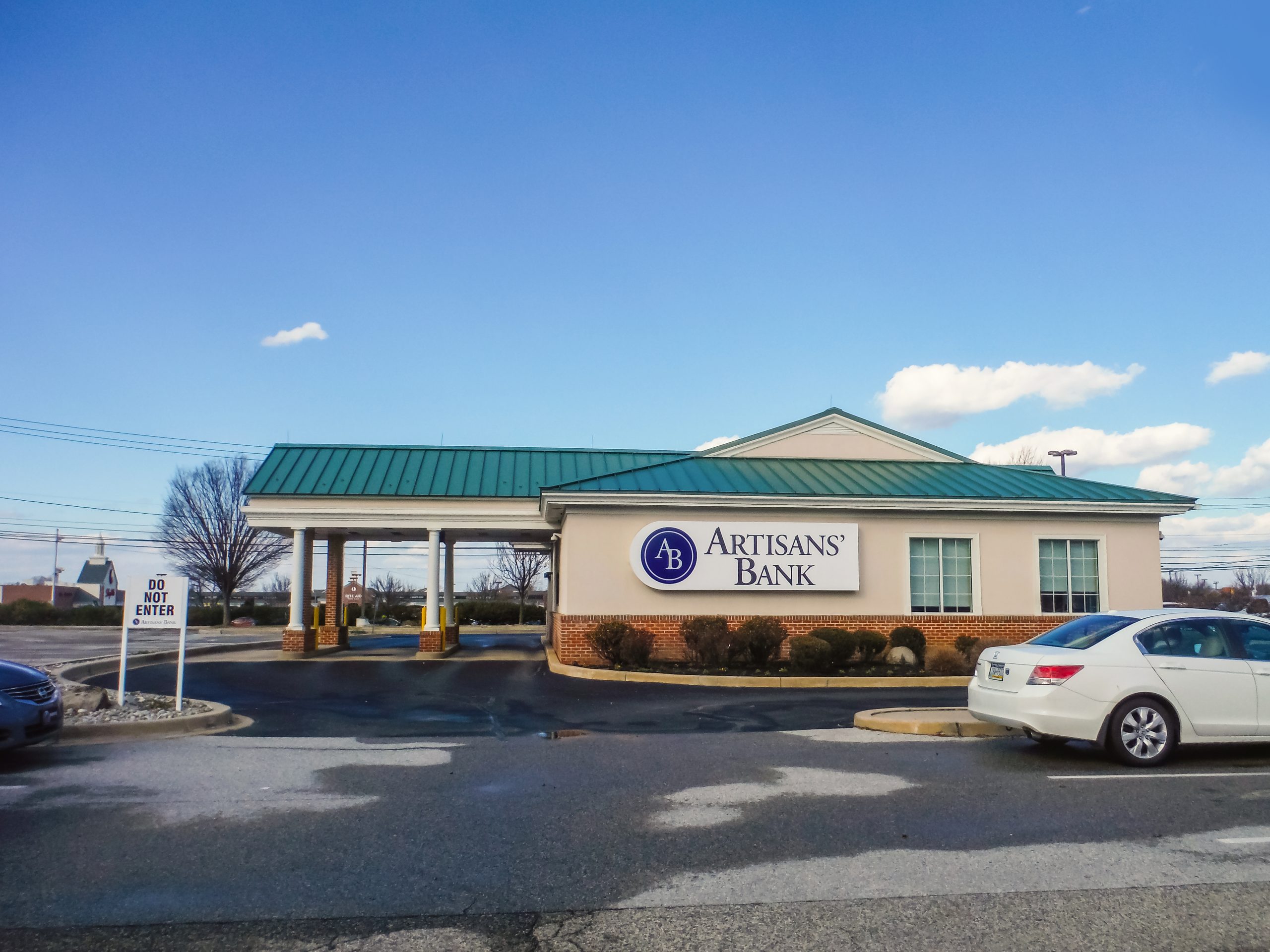 Artisans' Bank branch with drive-through canopy and green roof at Glendale Plaza Shopping Center