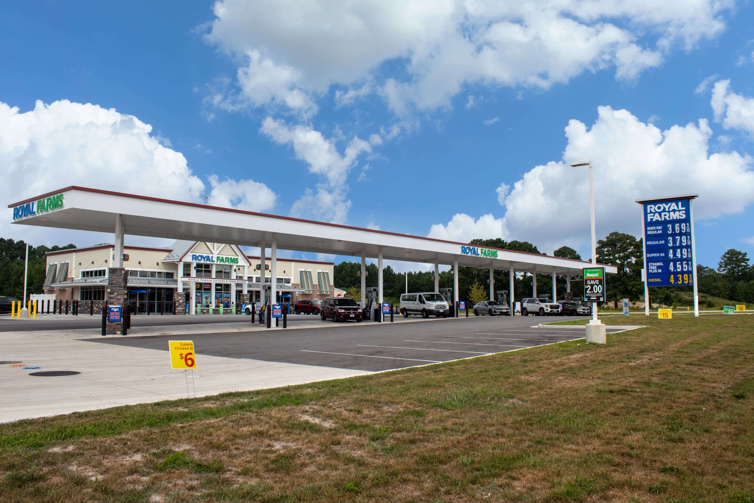 Royal Farms gas station and convenience store with fuel canopy, price sign, and parking lot at Somerset Crossing
