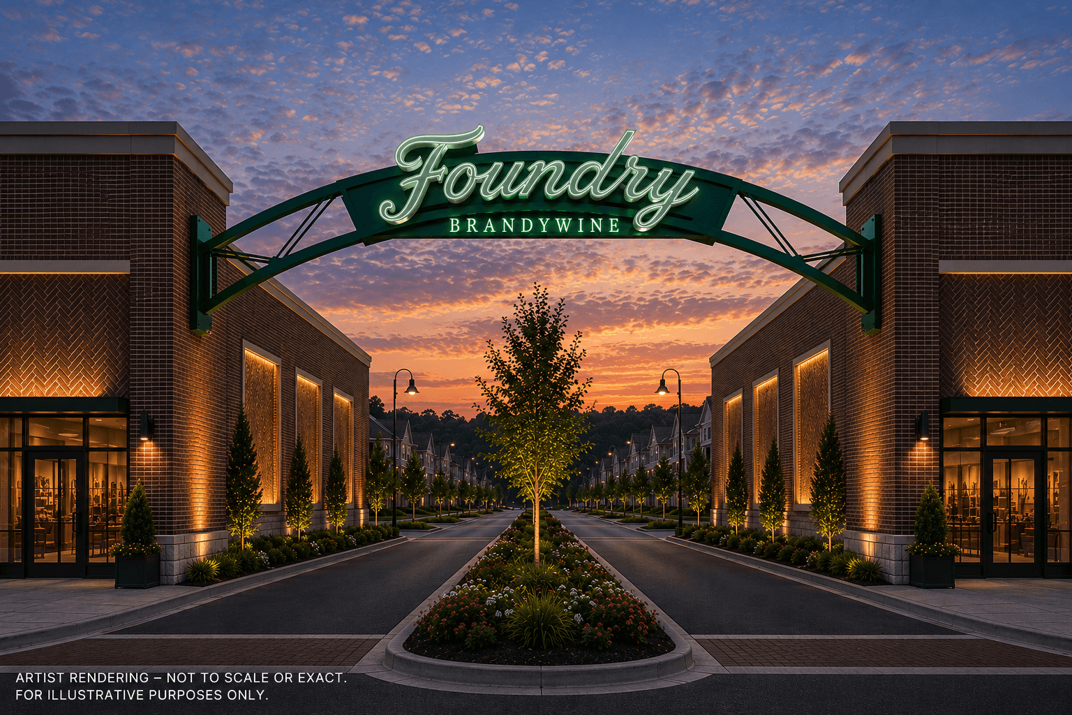 Illuminated Foundry Brandywine archway sign spans a tree-lined street between brick storefronts at dusk