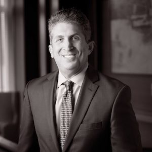 Black and white portrait of Michael Lefkowitz, who has recently joined Capano Management as Chief Financial Officer